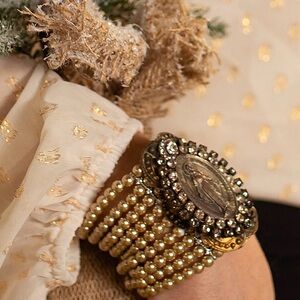 Gold Beaded Multi-Strand Bracelet with Ornate Medallion